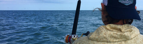 Fisherman trolling in the ocean